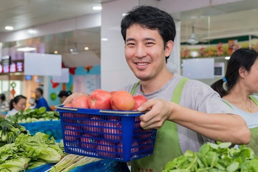 Visit a traditional wet market to shop with the locals