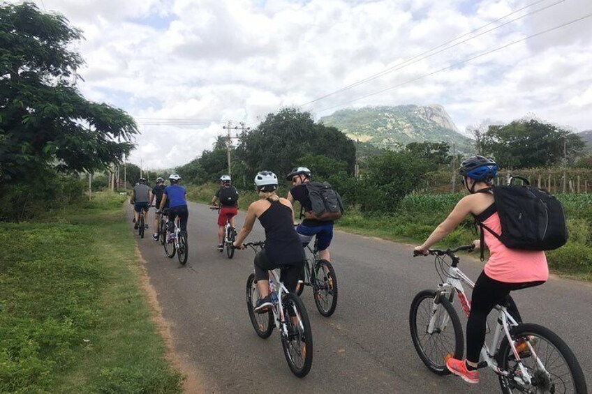 Cycle along the base of Nandi Hills learning about the history of this place, stories related to it and the small scale industries that thrive here.