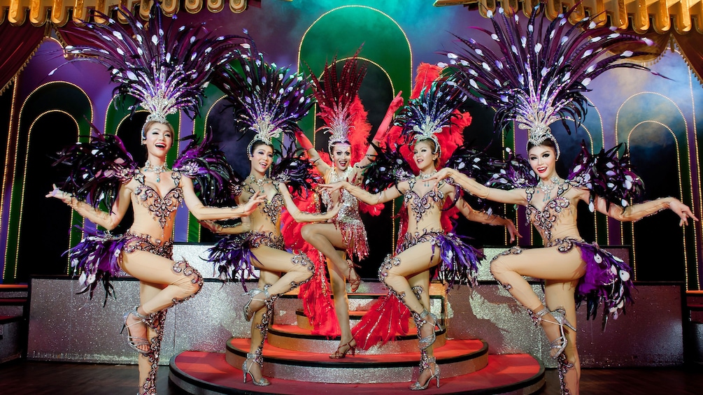 Elegant fan dancers at the Simon Cabaret Show in Thailand 