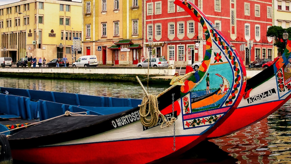 Colorful boats on a canal in Aveiro