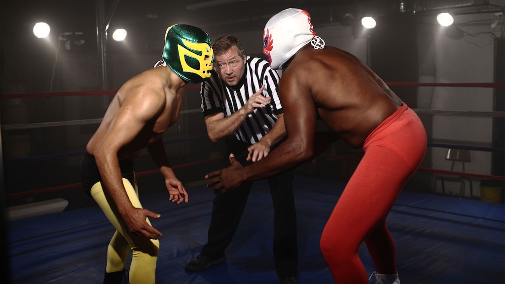 Two lucha libre fighters about to being a fight