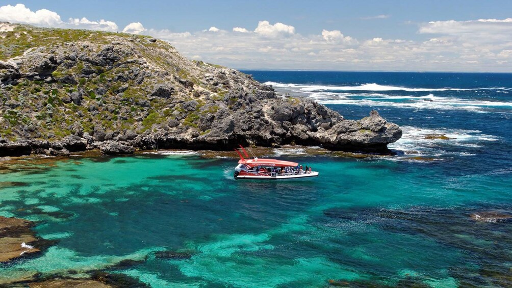 Boat coasting along the beach in Australia