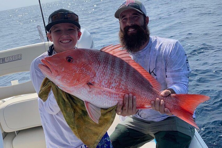 Brody and Calvin with a big Red Snapper