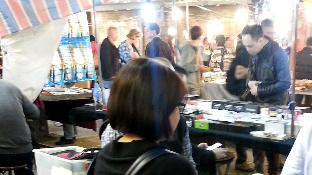 Show item 2 of 7. Busy night market in Hong Kong