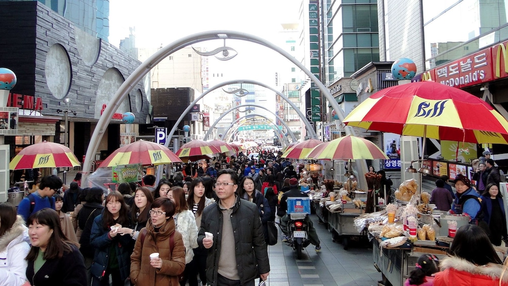 Crowded street in Busan during the day 