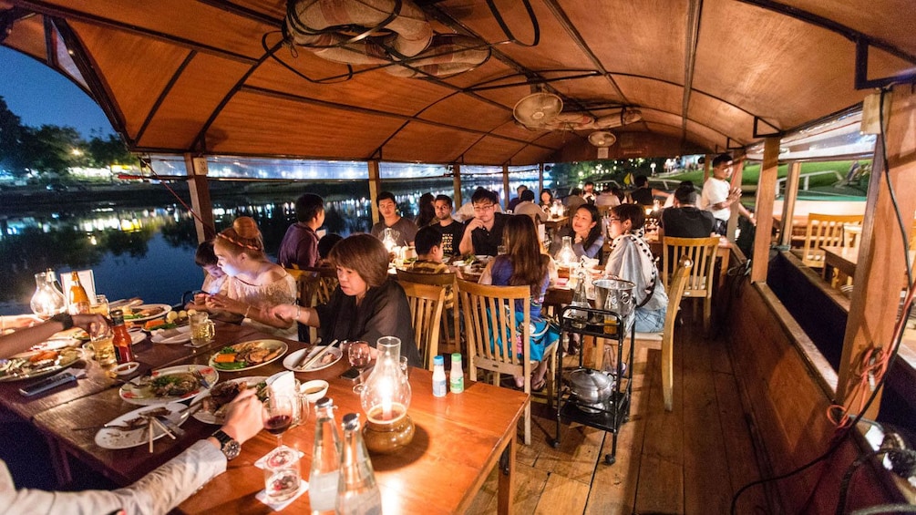 View of guests aboard the Ping River Dinner Cruise in Chiang Mai 