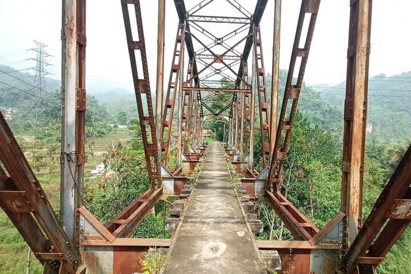 Walk on old train bridge and enjoy the panorama