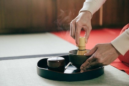 Experience Japanese calligraphy & tea ceremony at a traditional house in Na...