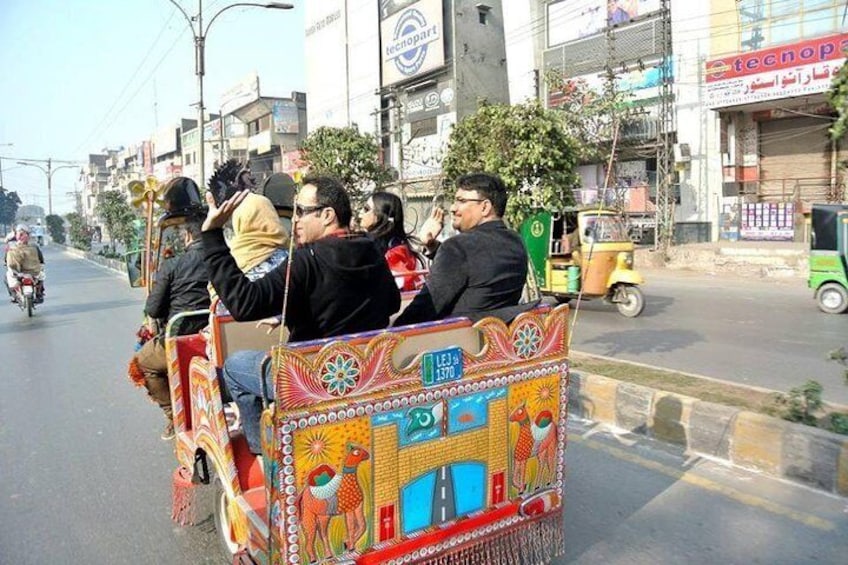 Tourist visiting Lahore at Traditional Rangeela Rikshaw