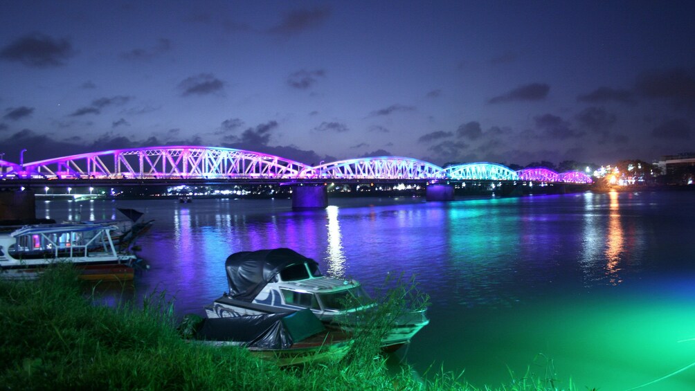 A bridge illuminated at night in Hue