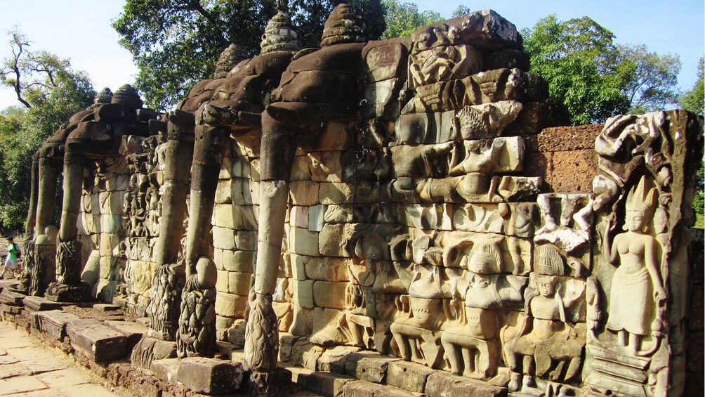 carved stone wall near siem reap