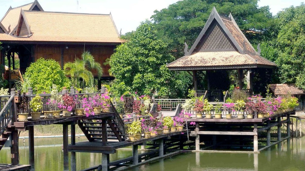 dock with purple flowers near Siem Reap