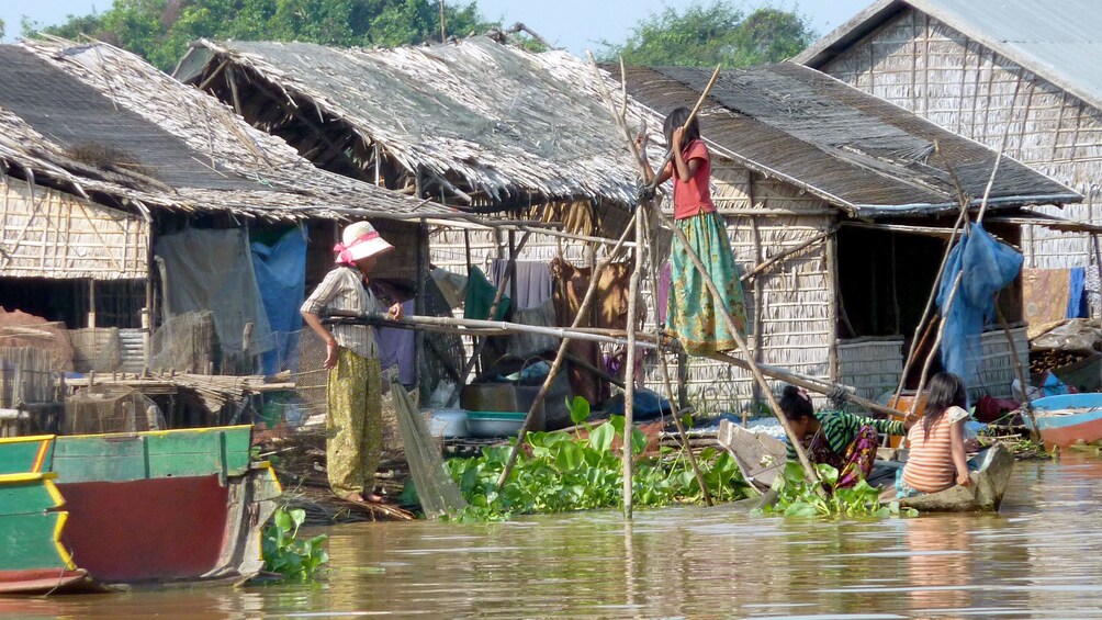 woman standing on dock in siem reap