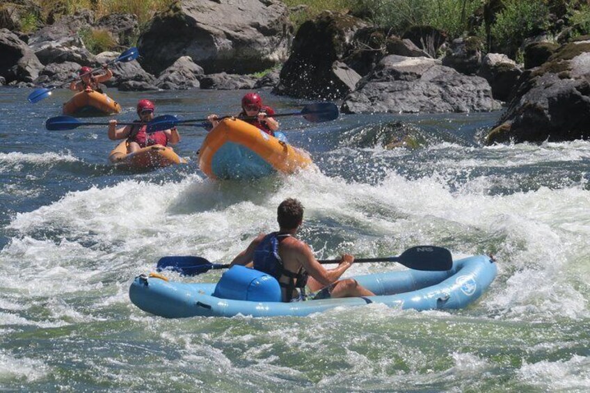 Guide watches on as people learn to kayak the Rogue River