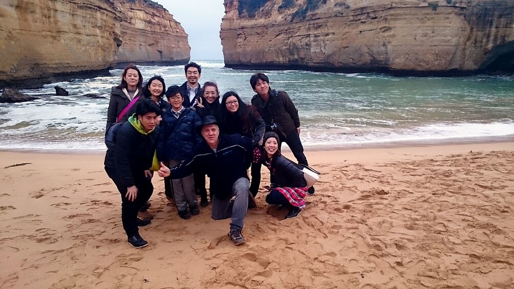 Group huddled at the beach in Melbourne