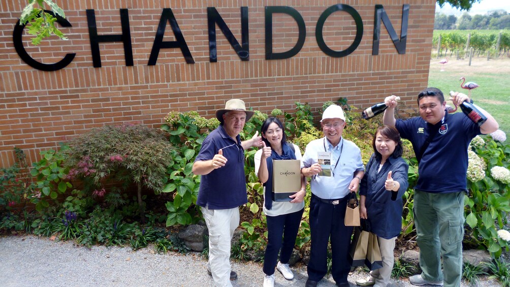 Visitors posing at the Chandon winery in Melbourne