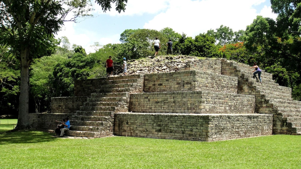 Tourists on ruins in Copán