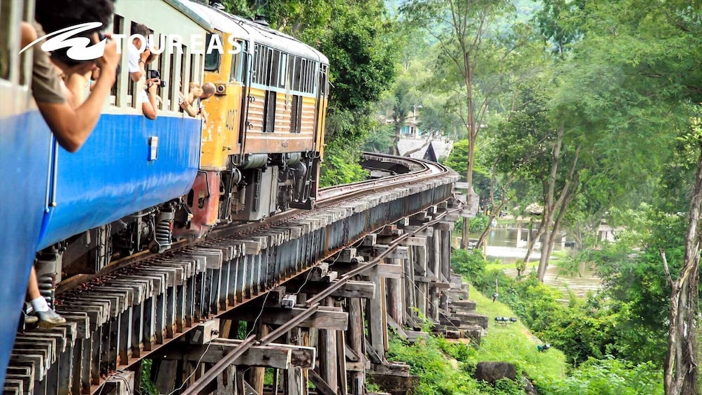 View off side of train crossing tracks in Western Thailand