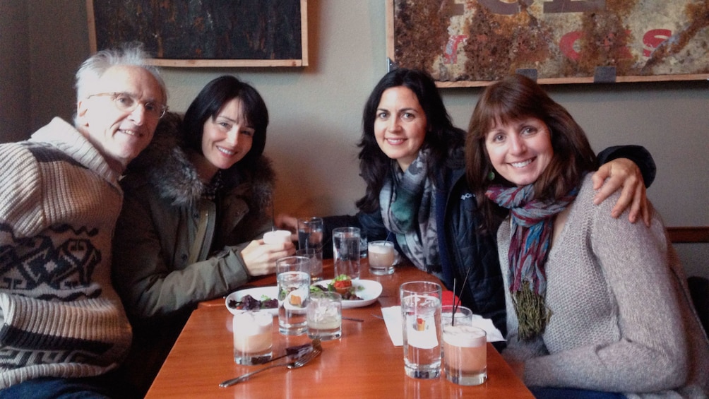 group at table on the culinary tour in portland