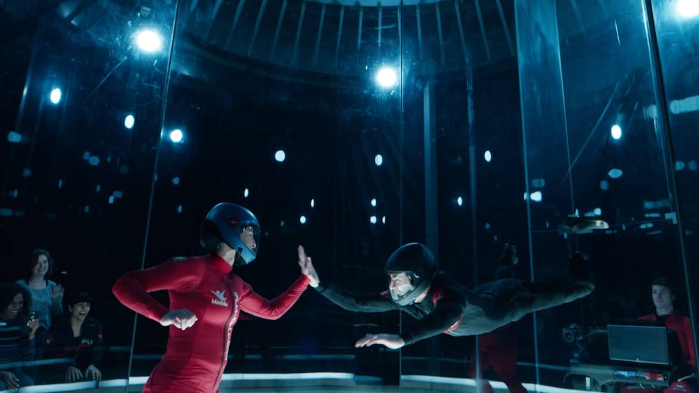 Tandem high fives at Two Flight Indoor Skydiving Experience