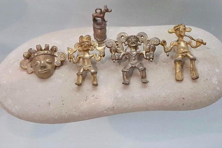 Gold images of shamans