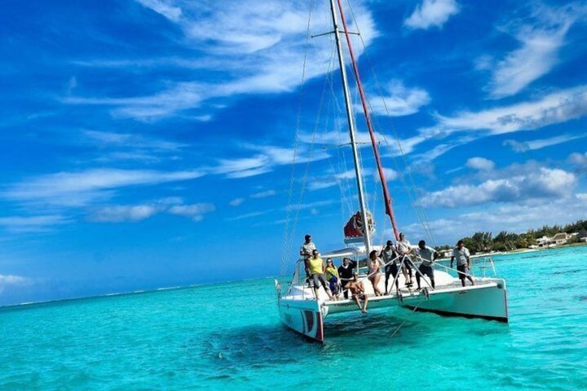 Catamaran Adventure Full Day: Ile aux cerfs,GRSE Waterfall,Snorkeling &BBQ Lunch