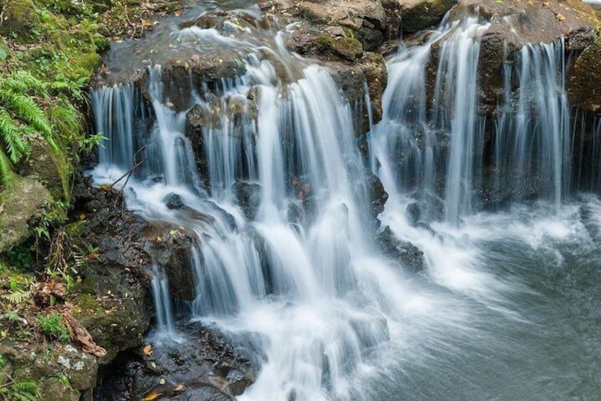 Waterfall in La Vallée des Couleurs Nature Park