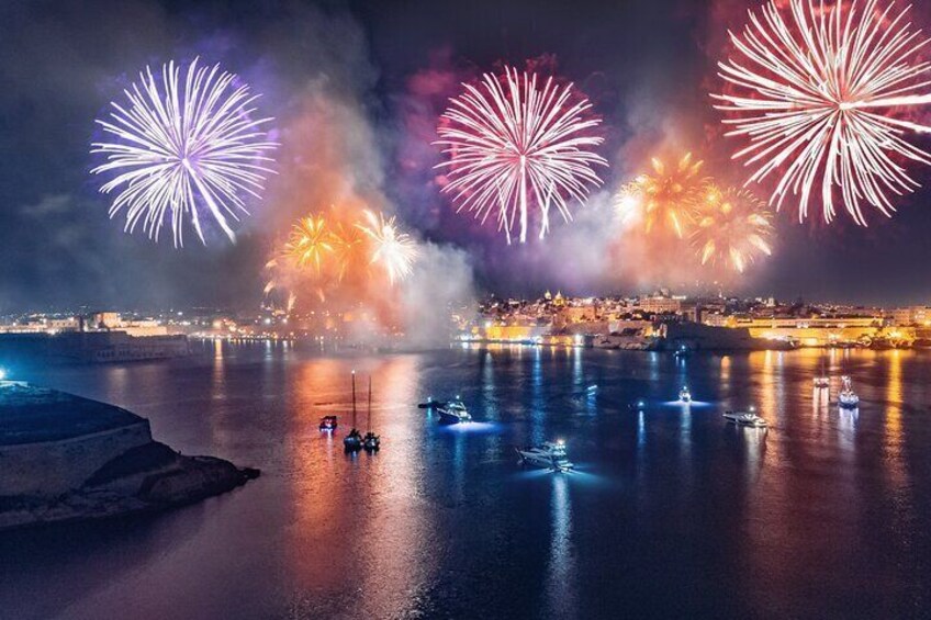 Experience the Malta fireworks festival from a catamaran