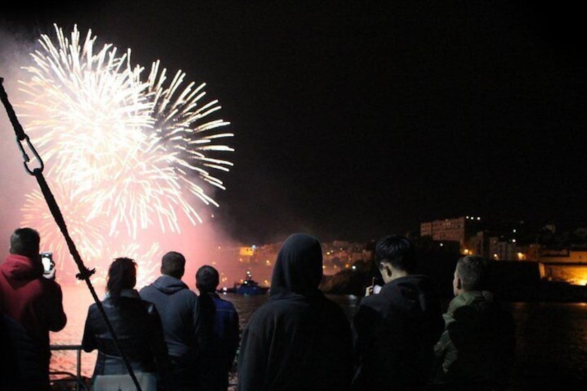 Experience the Malta fireworks festival from a catamaran