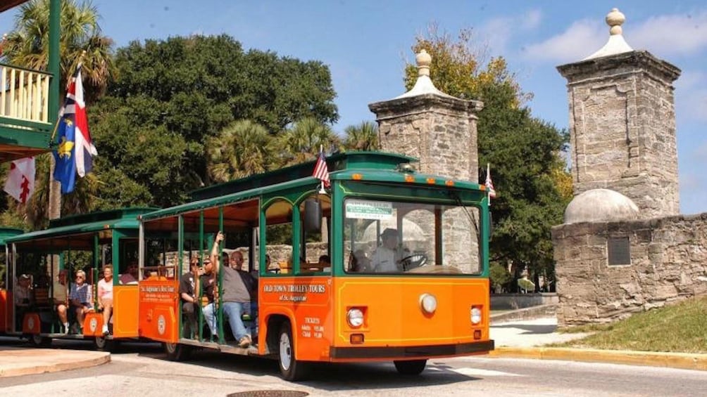 Trolley passing the Old City Gates in St. Augustine.