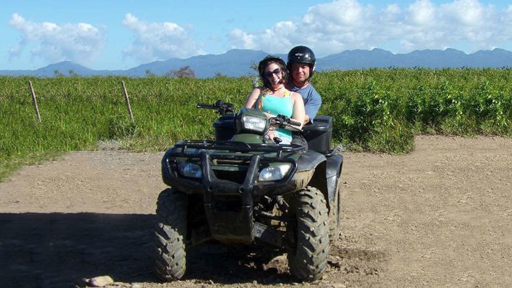 Couple on one ATV