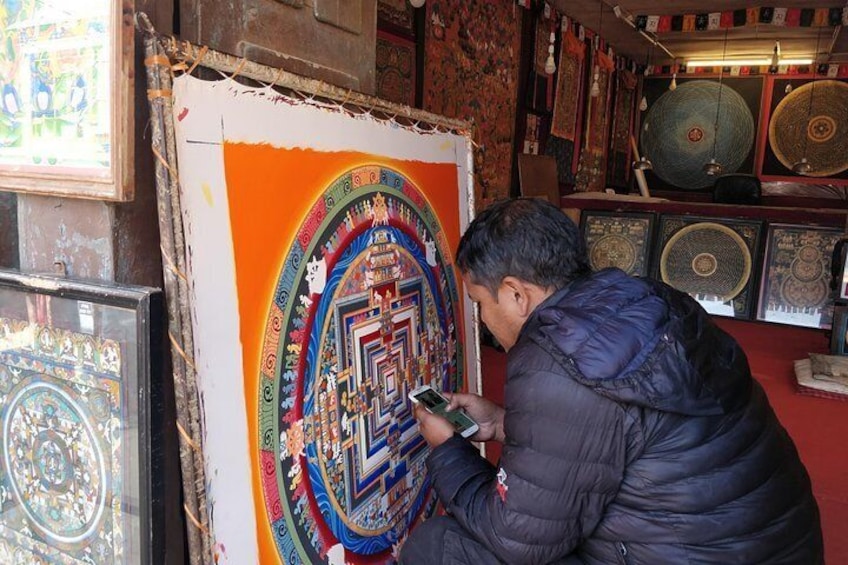 Tibetan buddhist painting called mandala which we can see in Changu Narayan temple