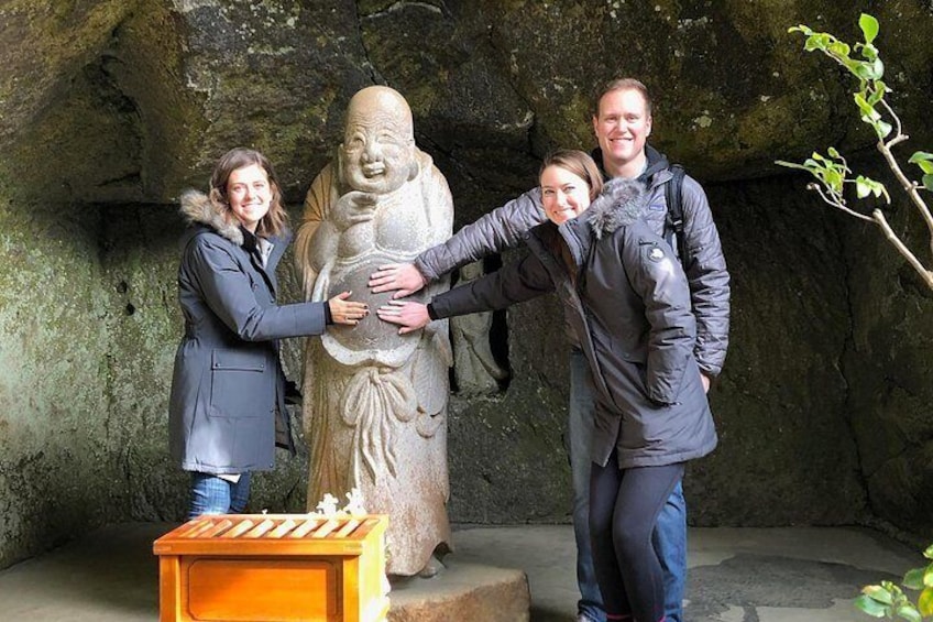 Touching Hotei at Jochiji Temple.