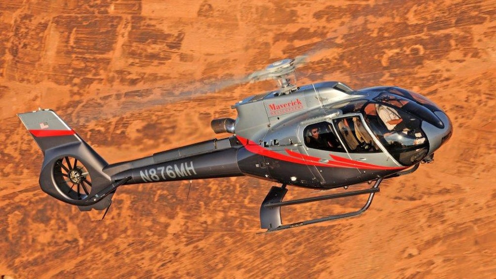 A helicopter flying in Grand Canyon