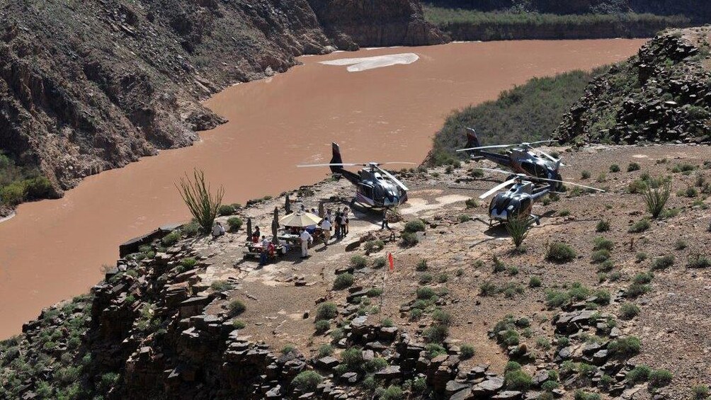Aerial view of helicopters next to the Colorado river.