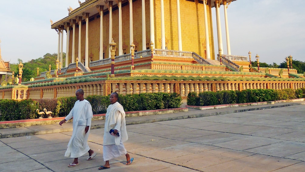 Two monks walking on the streets of Phnom Penh 