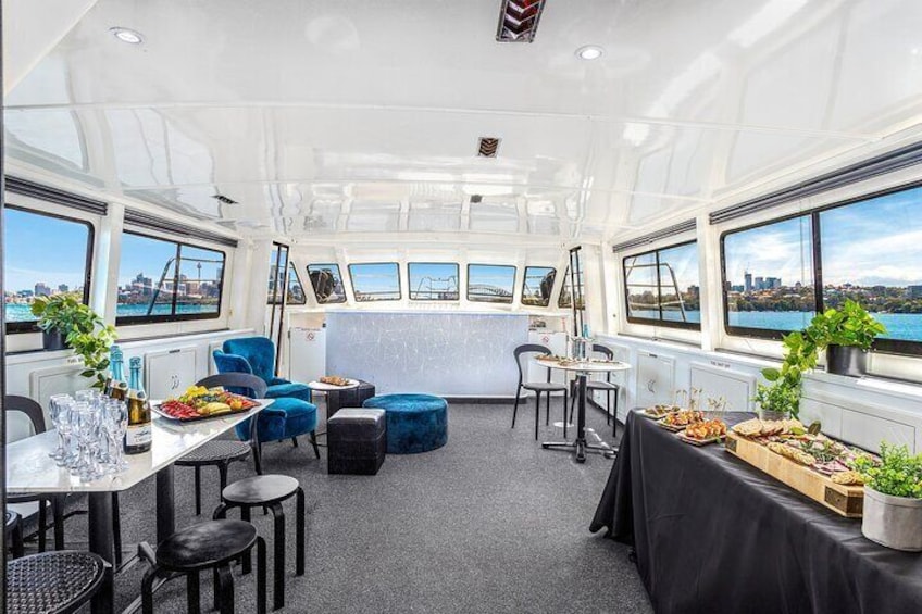 Vivid 90-Minute Sydney Harbour Intimate Catamaran Cruise with Canapes