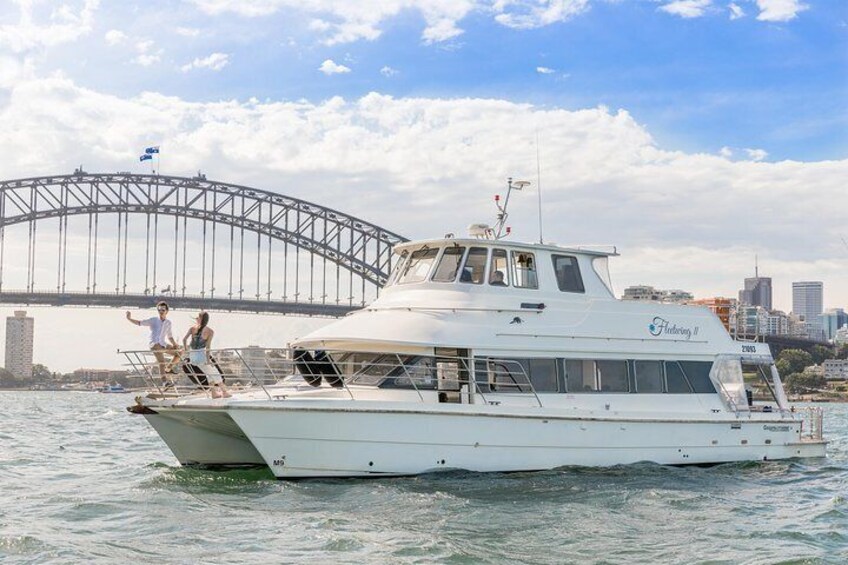 Vivid 90-Minute Sydney Harbour Intimate Catamaran Cruise with Canapes