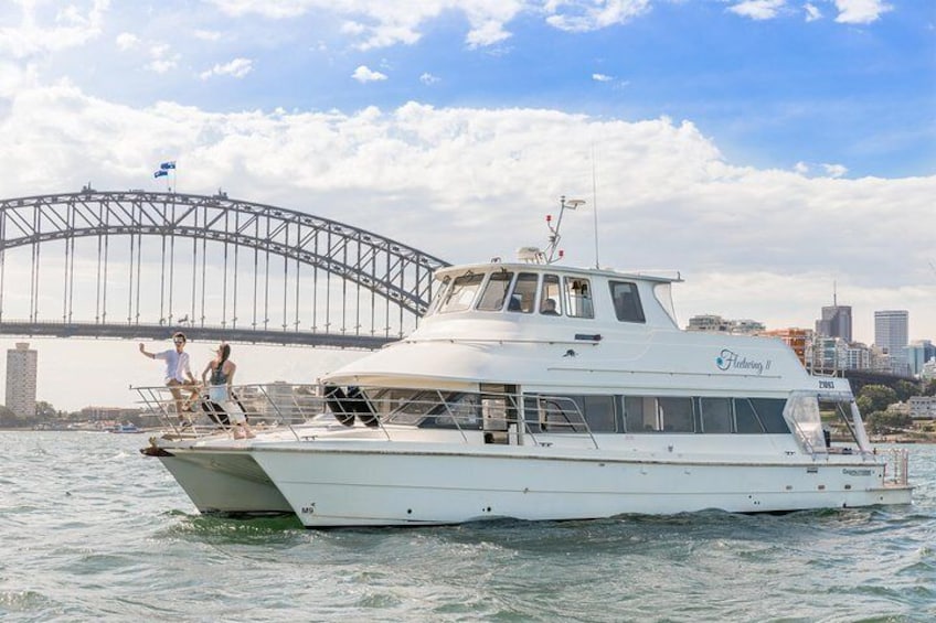 Vivid 90-Minute Sydney Harbour Intimate Catamaran Cruise with Canapes
