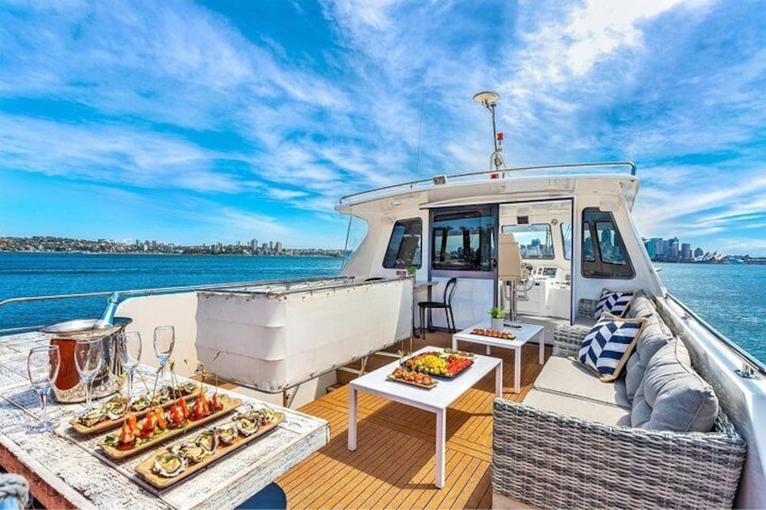 Vivid 90-Minute Sydney Harbour Intimate Catamaran Cruise with Canapes