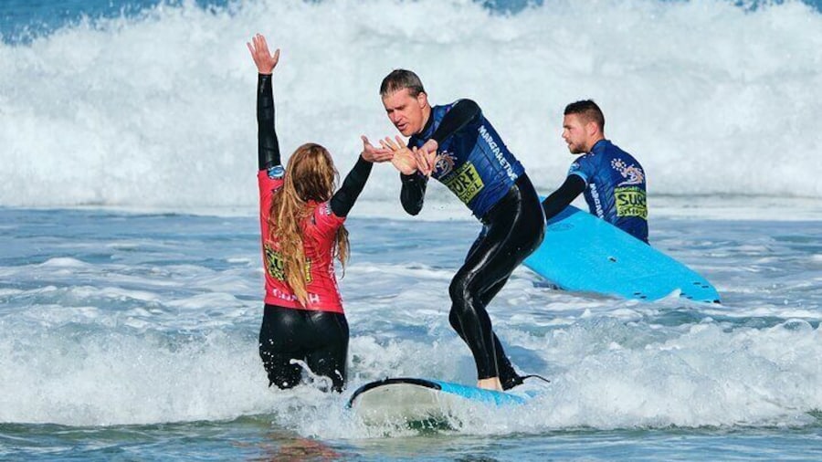Celebrate your progress with a high five from our enthusiastic coaches. Your success is our success!