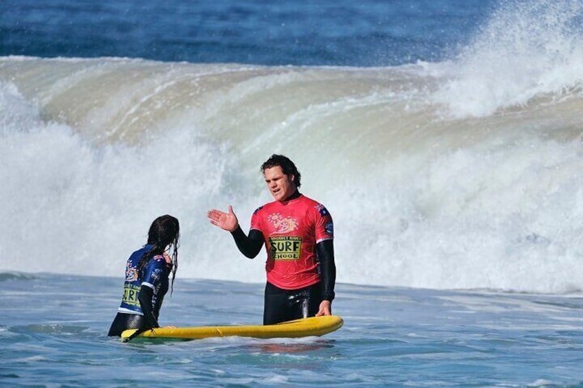 Personalized guidance at its best. Witness a coach providing one-on-one feedback to nurture each surfer's skills