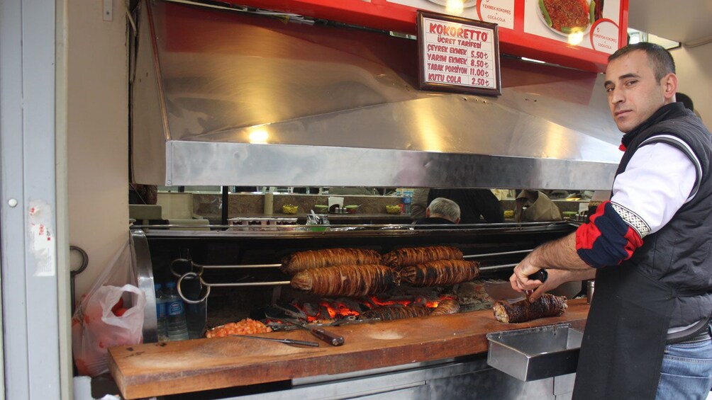 Man preparing food in the back of a kitchen in Istanbul 