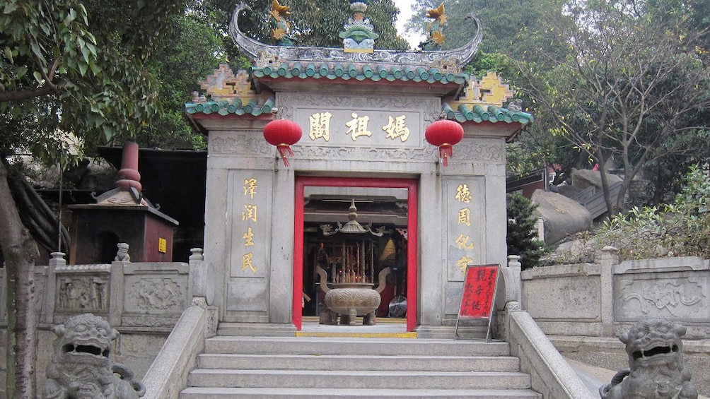 Show item 2 of 5. The entrance to a temple in Macau