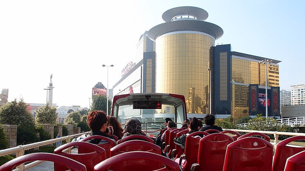 Show item 1 of 5. A view of Macau from the top of a hop on hop off bus