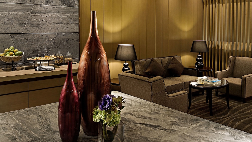 Show item 2 of 6. Table setting at Macau International Airport Lounge