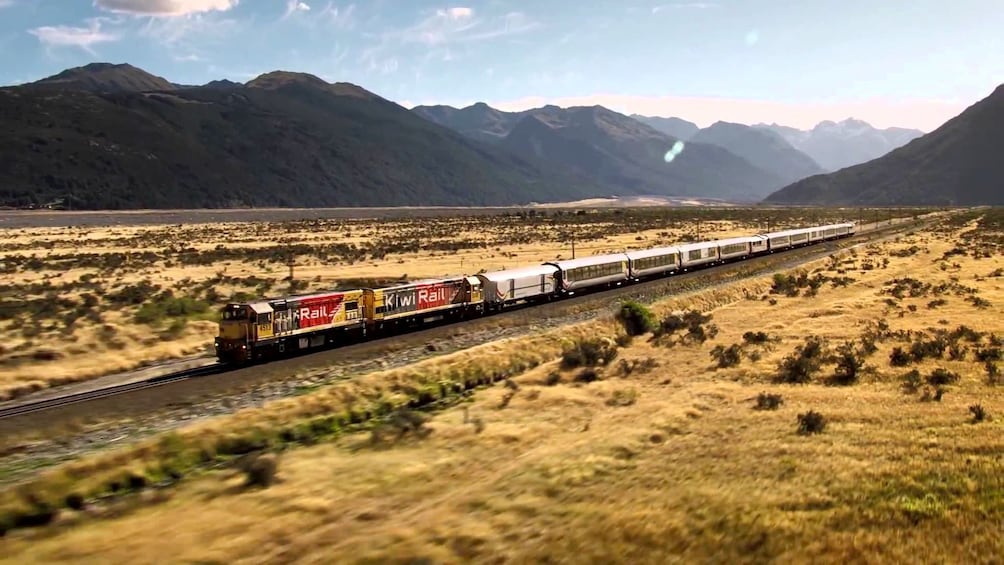 Train in valley in West Coast Franz Josef Glacier tour in Christchurch New Zealand. 