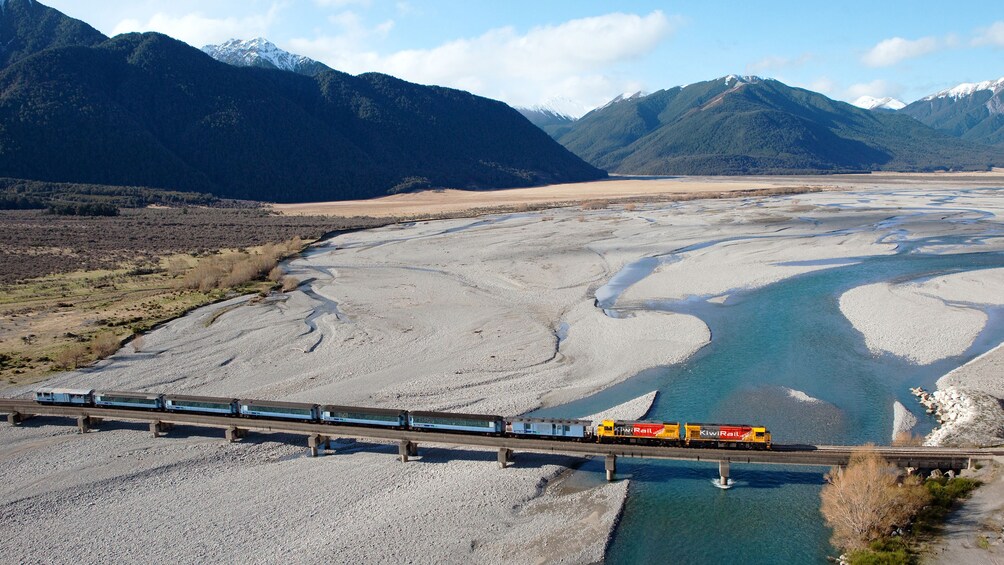 Train on bridge in West Coast Franz Josef Glacier tour in Christchurch New Zealand. 