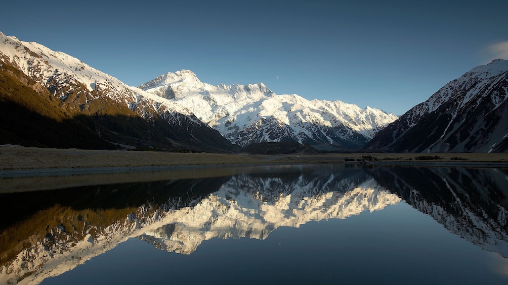 Reflection of Mount Cook  on water in New Zealand. 