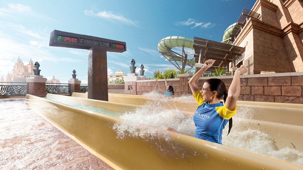 Water slide racing at Aquaventure Waterpark in Dubai